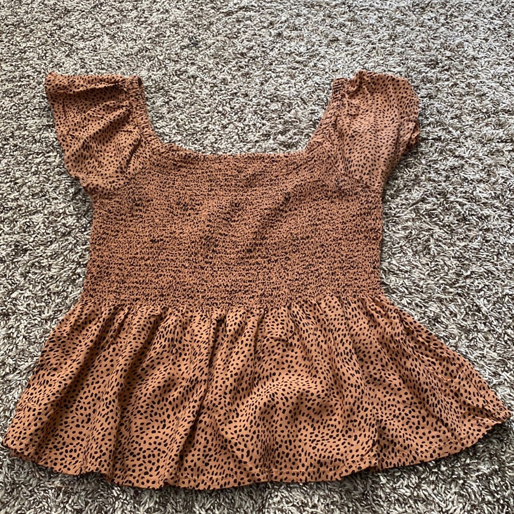 Animal print off the shoulder peplum top